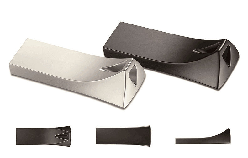 Two triangle-shaped USB flash drives, one silver and one black.