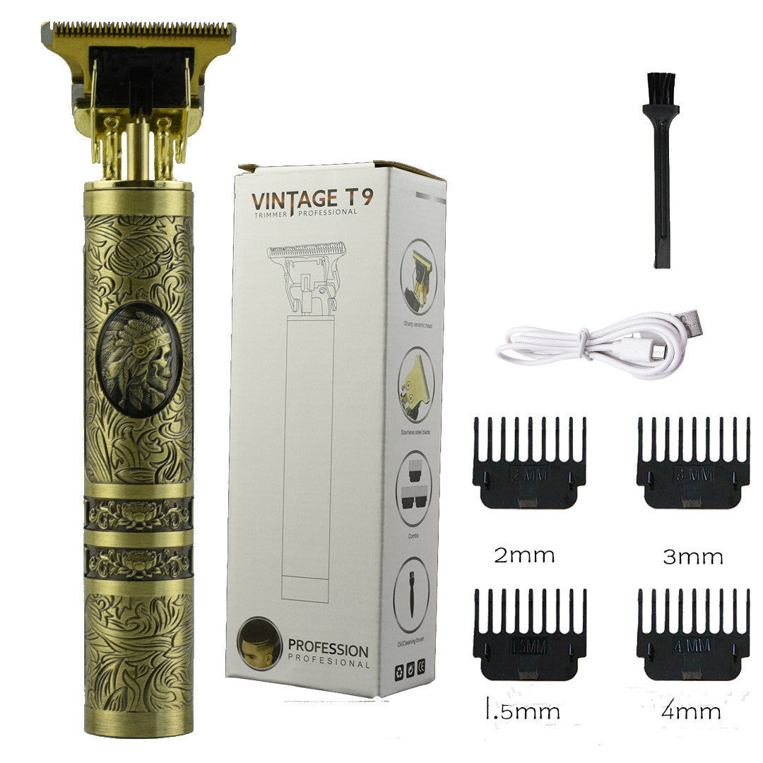A Gold-colored hair trimmer with an ornate design, along with several attachment combs and a charging cable. The product is packaged in a box that features the name 'Vintage T9'.