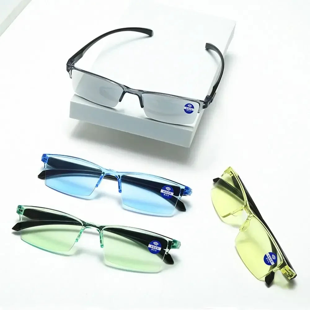 Four pairs of glasses with different colored lenses on a white background