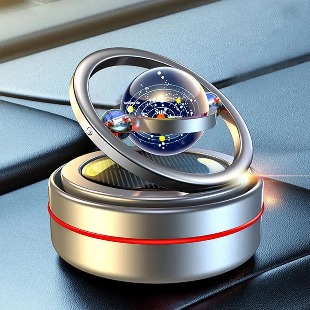 A car oil diffuser with a solar system theme, featuring a rotating globe on top.