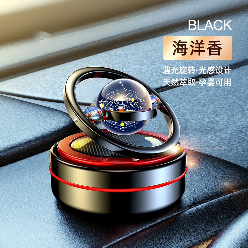 A car oil diffuser with a solar system theme, featuring a rotating globe on top, Bla.k