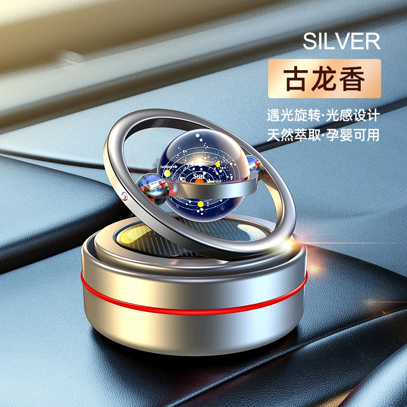 A car oil diffuser with a solar system theme, featuring a rotating globe on top, Silver.