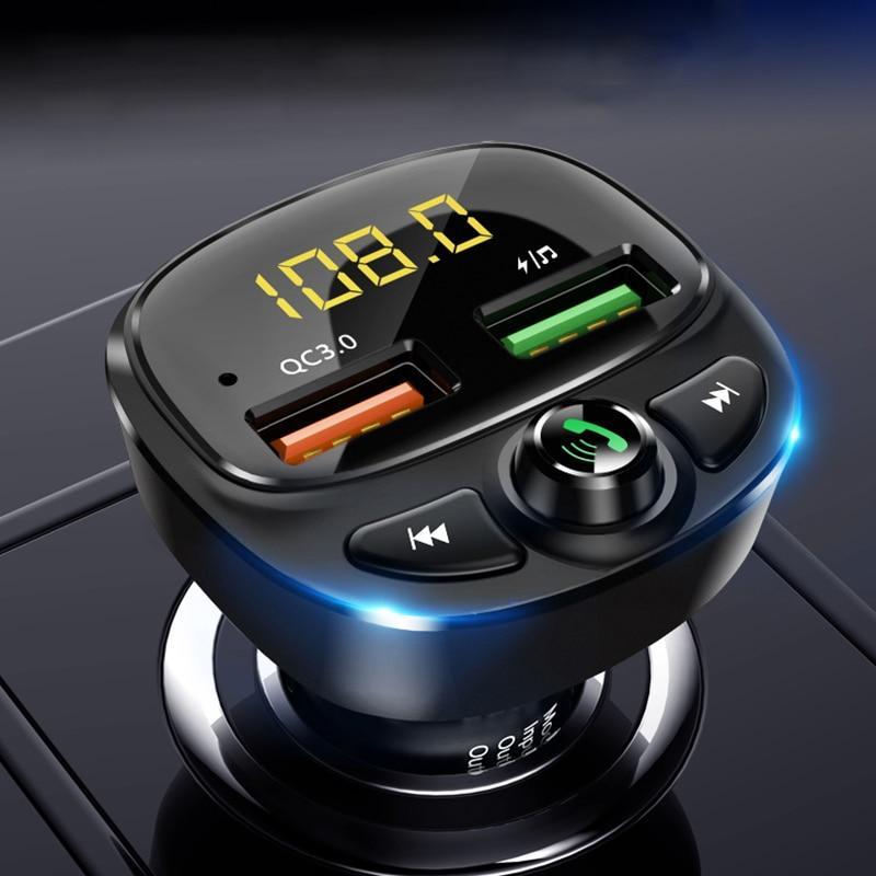 A black car MP3 player with a digital display, buttons for navigation and functions, and a USB port.