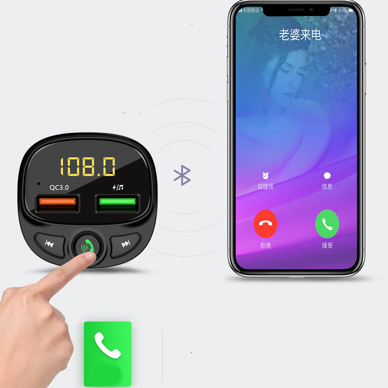 A black car MP3 player with a digital display, buttons for navigation and functions, and a USB port.