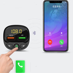 A black car MP3 player with a digital display, buttons for navigation and functions, and a USB port.