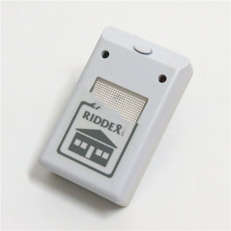 Electronic white mouse repeller with a house icon and a illustration of a mouse being deterred.