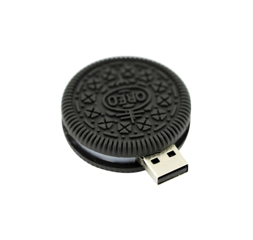 A USB flash drive designed to look like a sandwich cookie with the Oreo brand on the top and bottom halves.