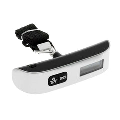 A hand holding a black luggage scale with a green LCD screen displaying weight, featuring a hook and button for operation.