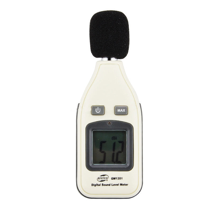 A handheld digital sound level meter with a black microphone cover, buttons, and a digital display showing a reading.