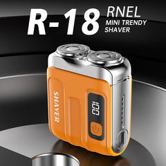 Orange and silver R-18 RNEL mini trendy shaver on a reflective surface with a black background