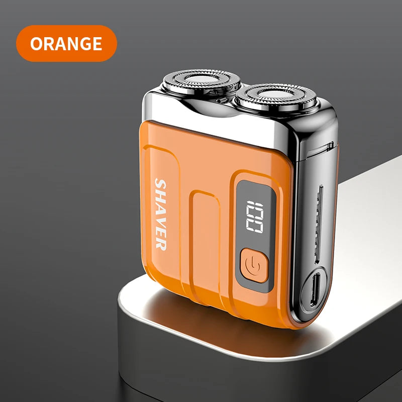 Orange electric shaver on a gray background with 'ORANGE' label.