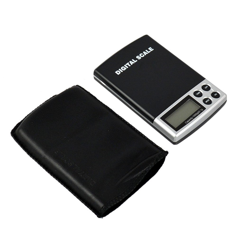 A small, silver electronic scale with a blue LCD screen and a stainless steel tray, with cover.