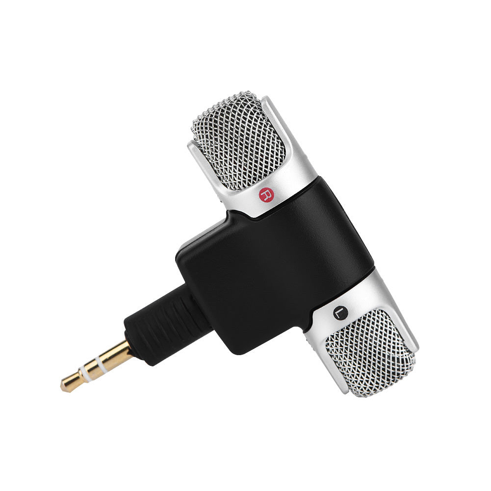A black and silver mini stereo microphone with a 3.5 mm plug.