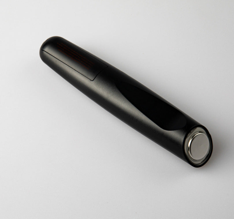 Black Mosquito Bite Relief device with a metallic component.