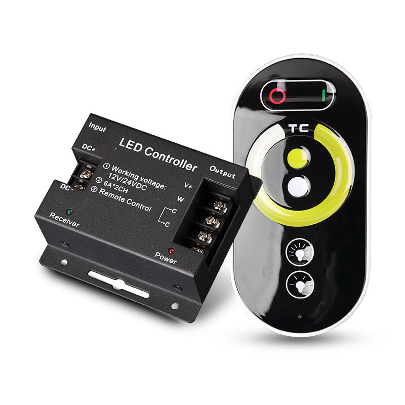 RF Touch two-color temperature controller with a black iron shell and a green and white touch-sensitive dial.