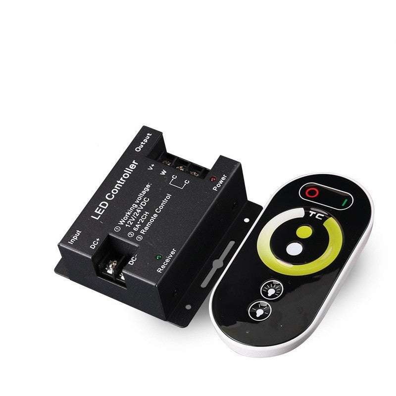 RF Touch two-color temperature controller with a black iron shell and a green and white touch-sensitive dial.