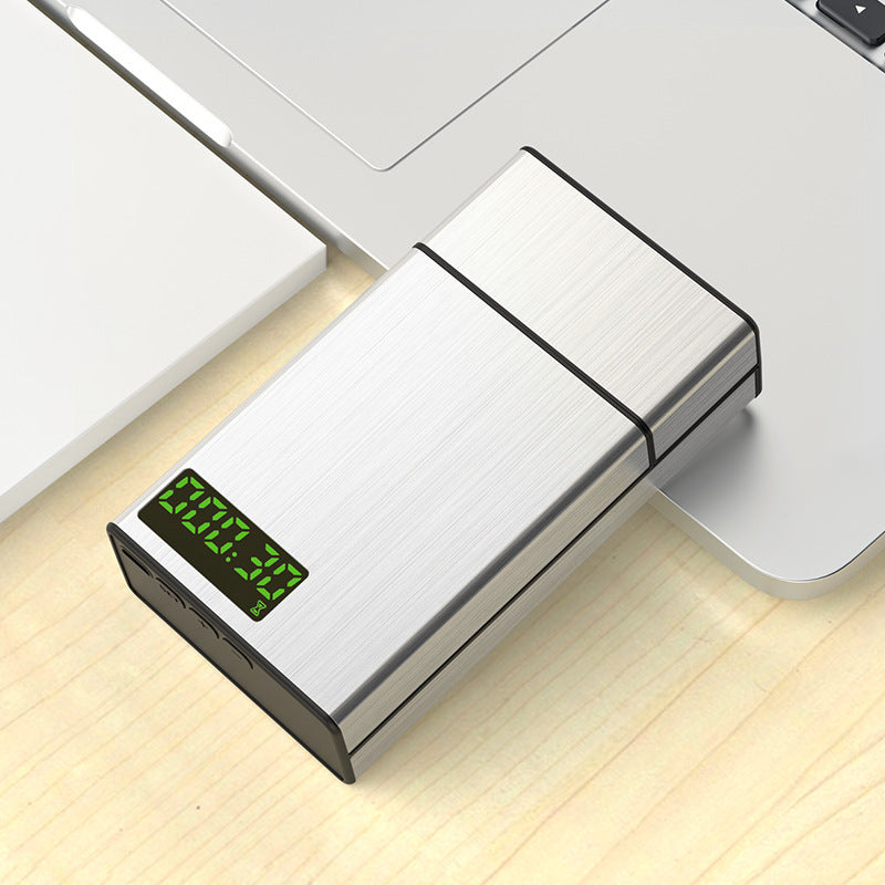 A timing lock box for smoking control with a digital display, shown in silver and black colors.