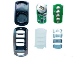 A black universal multi-programmable remote control with four buttons and a keychain.