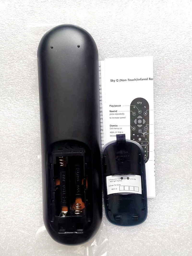 A black universal remote control with buttons, joypad, and model label.
