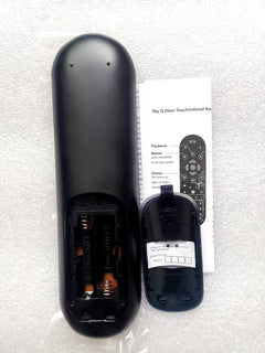 A black universal remote control with buttons, joypad, and model label.