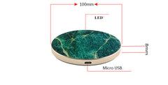 A collection of wireless chargers with a circular design, available in white, black, and green colors, with a marble pattern and a gold edge.